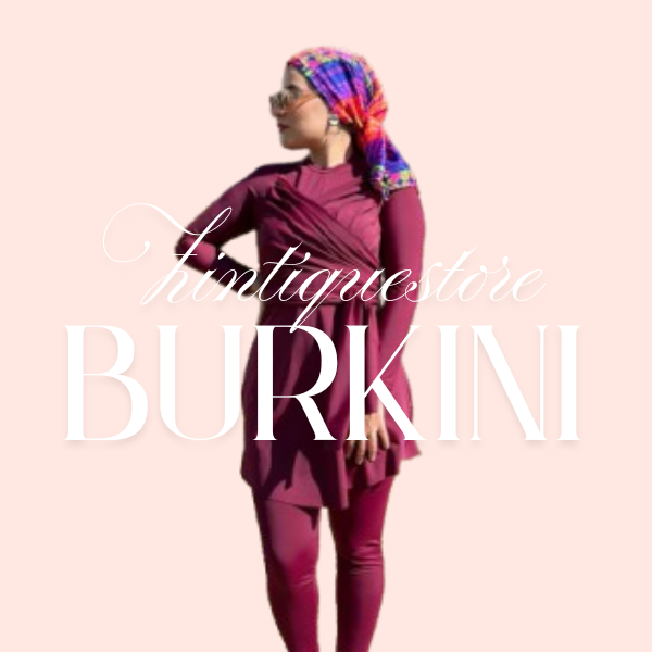 Femme portant un burkini élégant de la boutique Zintiquestore, composé d’un haut long manches, d’un pantalon assorti et d’un bonnet de bain, dans des tons bleu marine et turquoise avec des motifs géométriques modernes.